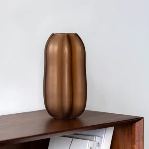 Ribbed Frosted Amber Pumpkin Glass Vase, Short or Tall in clay — in a room setting