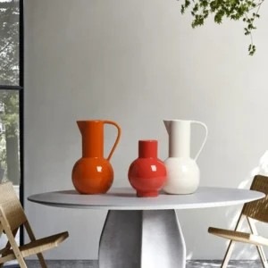 Glossy Round-Belly Ceramic Vases in Yellow, Green and White — in a room setting