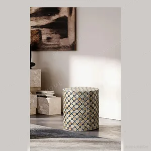 Quatrefoil Capiz Shell Drum Side Table in Cream and Navy — in a room setting