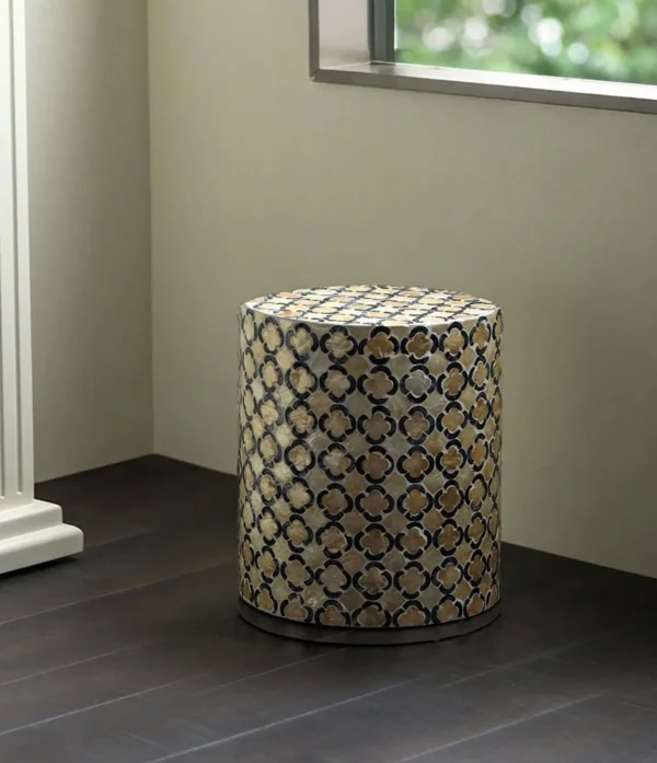 Quatrefoil Capiz Shell Drum Side Table in Cream and Navy — in a room setting