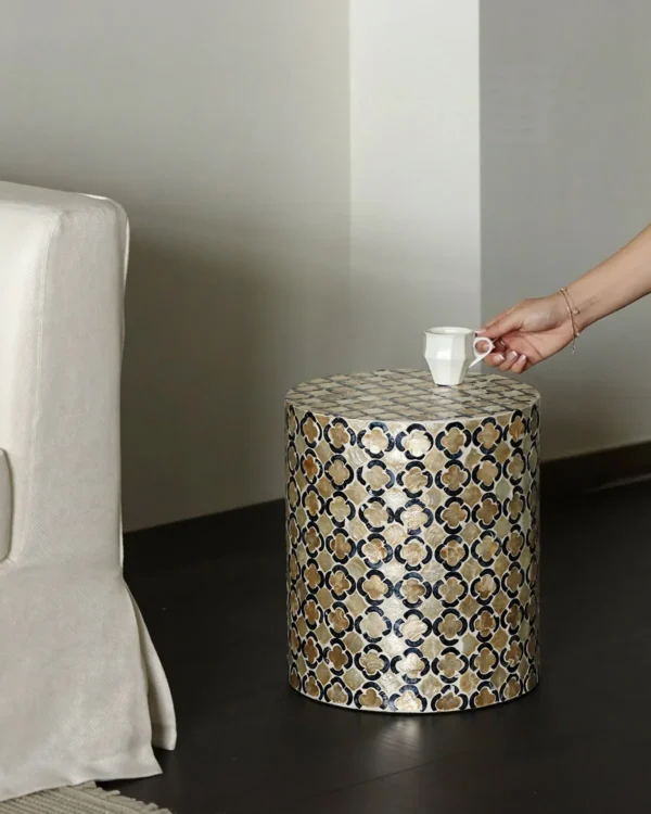 Quatrefoil Capiz Shell Drum Side Table in Cream and Navy — in a room setting