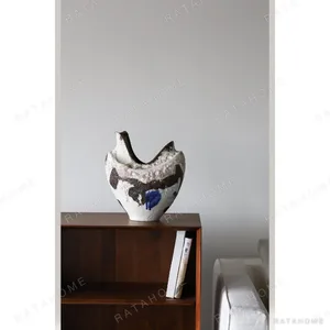 Rock Trace Stoneware Vase with Ink and Blue Glaze Strokes in ivory — in a room setting