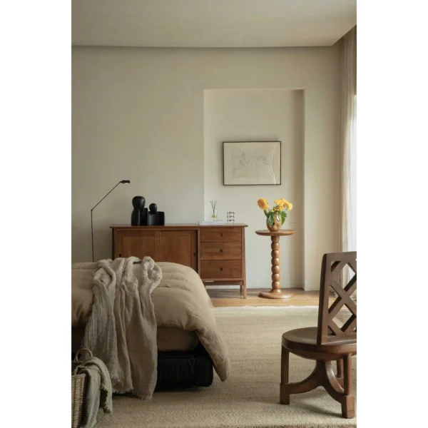 Vintage Teak Beaded Column Side Table in clay — in a room setting