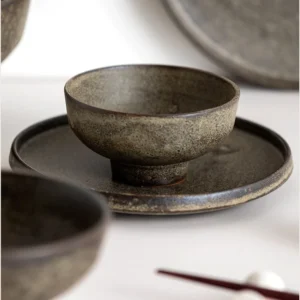 Vintage Textured Stoneware Footed Bowls and Plates in clay — front view