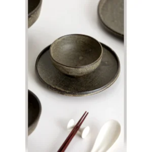 Vintage Textured Stoneware Footed Bowls and Plates in clay — in a room setting