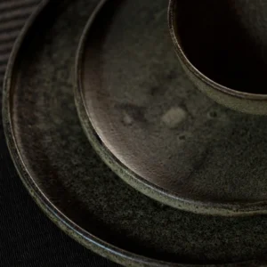 Vintage Textured Stoneware Footed Bowls and Plates in clay — in a room setting