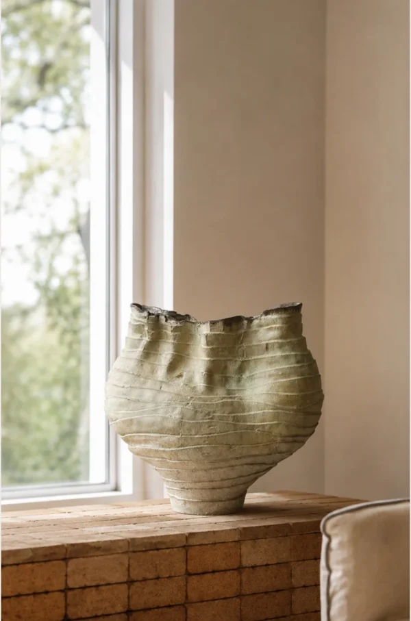 Hand-Made Twisted Pleated Vase in Pale Moss Glaze — in a room setting