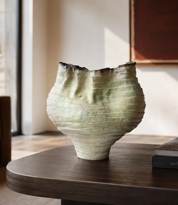 Hand-Made Twisted Pleated Vase in Pale Moss Glaze — in a room setting