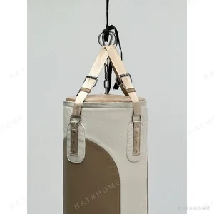 Two-Tone Leather Hanging Punching Bag in Cream and Brown — in a room setting