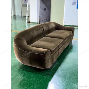 Vintage Curved Sofa in Caramel Velvet with Rounded Arms — in a room setting