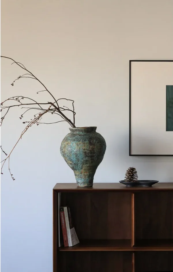 Jingdezhen Rust-Green Distressed Jar Vase, Tall or Short in olive — in a room setting