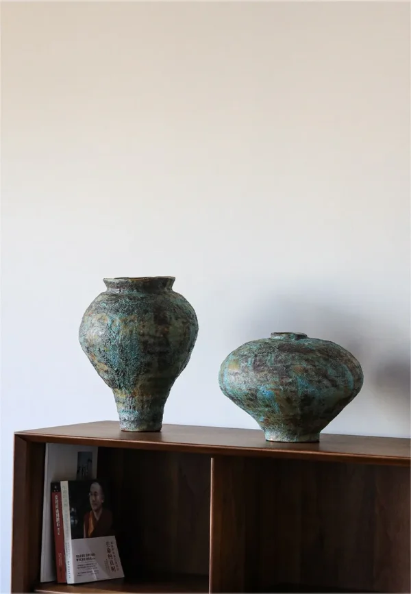 Jingdezhen Rust-Green Distressed Jar Vase, Tall or Short in olive — in a room setting