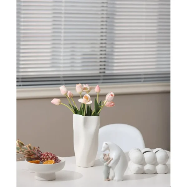 Matte Wave-Form Ceramic Vases in White, Green and Pink — in a room setting