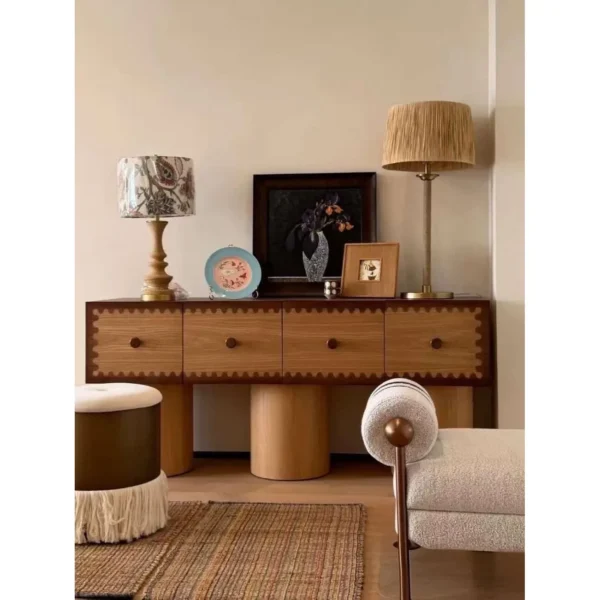 Vintage Scalloped-Trim Oak Sideboard on Cylinder Legs in natural oak — in a room setting