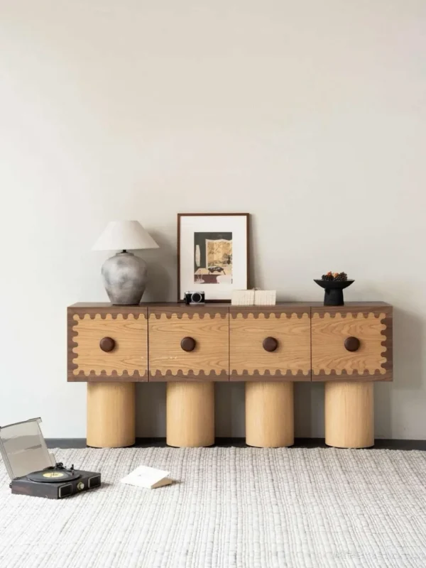 Vintage Scalloped-Trim Oak Sideboard on Cylinder Legs in natural oak — in a room setting