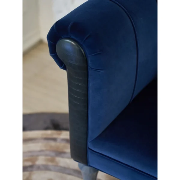 Violet Blue Velvet Armchair in blue — in a room setting