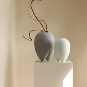Wabi-Sabi Bisque Ceramic Vases in White and Taupe, Medium — in a room setting