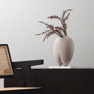 Wabi-Sabi Bisque Ceramic Vases in White and Taupe, Medium — in a room setting