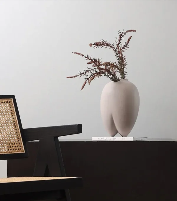 Wabi-Sabi Bisque Ceramic Vases in White and Taupe, Medium — in a room setting