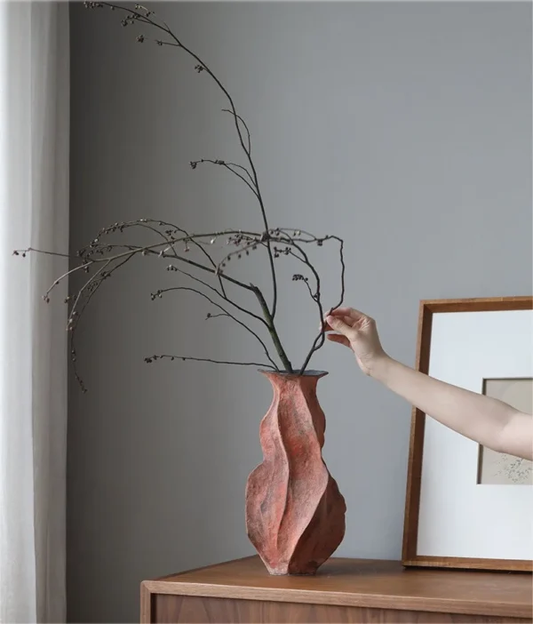 Red Clay Pleated Gourd Stoneware Vase, Medium in rust — in a room setting
