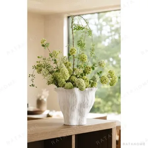 Wabi-Sabi Hand-Pinched Pleated Trumpet Vase in oatmeal — in a room setting