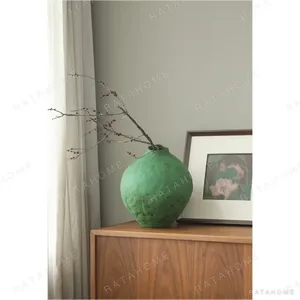 Hand-Thrown Matte Green Egg Jar Vase, Large or Small in olive — in a room setting