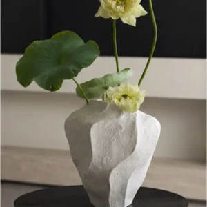 Designer Wabi-Sabi Folded Texture Ceramic Vase, Short in ivory — in a room setting