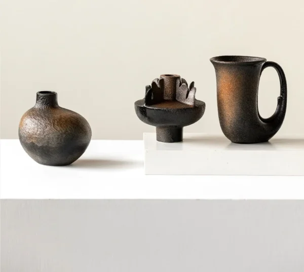Wabi-Sabi Black Sculptural Vases in Three Forms — in a room setting