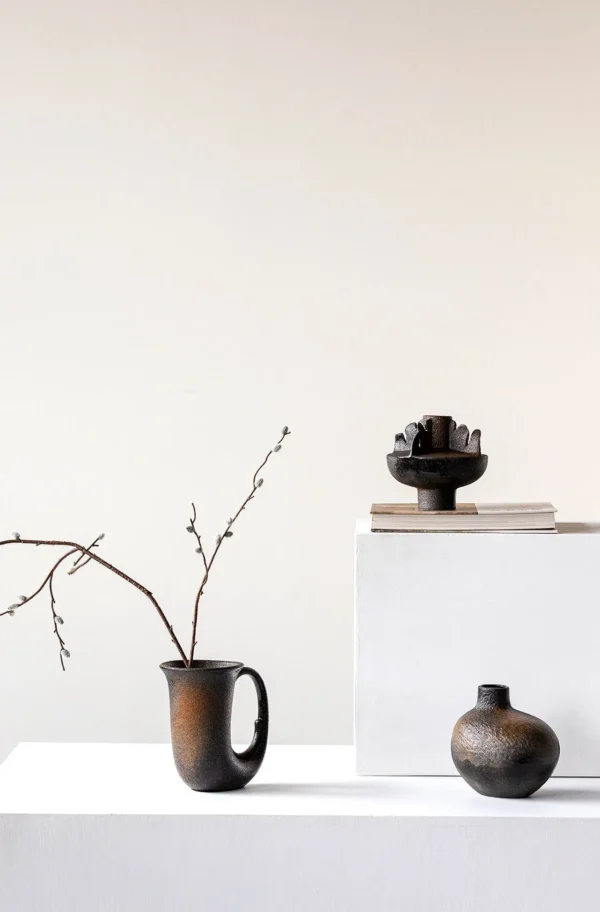 Wabi-Sabi Black Sculptural Vases in Three Forms — in a room setting