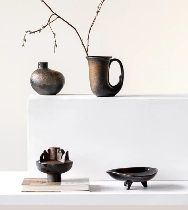 Wabi-Sabi Black Sculptural Vases in Three Forms — in a room setting