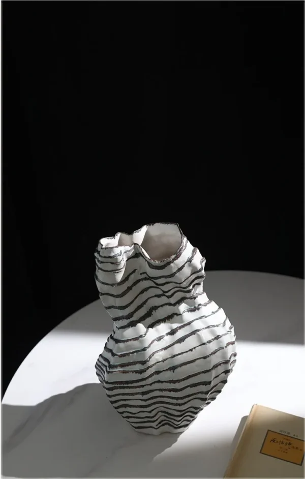 Jingdezhen Black Line Pleated Art Vases, Three Forms in ivory — in a room setting