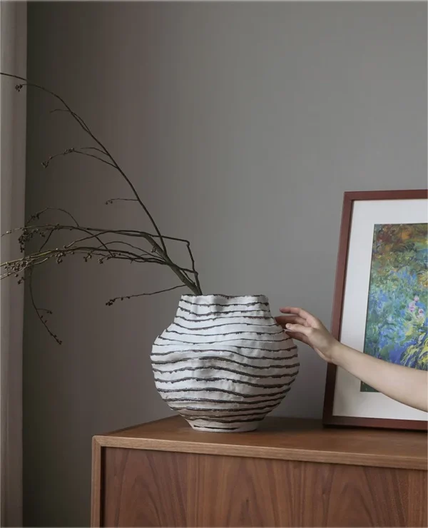 Jingdezhen Black Line Pleated Art Vases, Three Forms in ivory — in a room setting