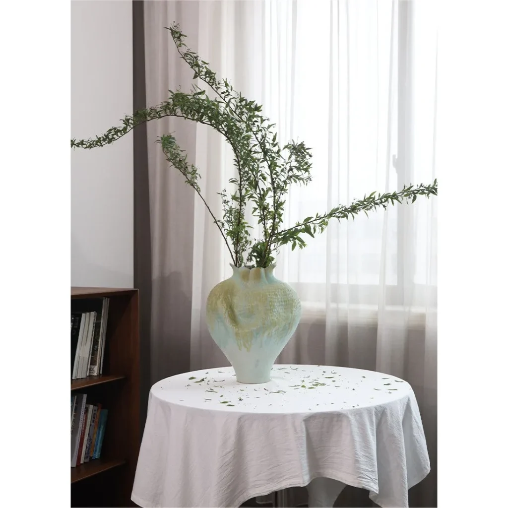 Jingdezhen Celadon Gradient Pomegranate Floor Vase, Large in olive — in a room setting
