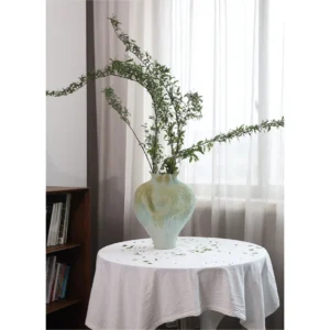Jingdezhen Celadon Gradient Pomegranate Floor Vase, Large in olive — in a room setting