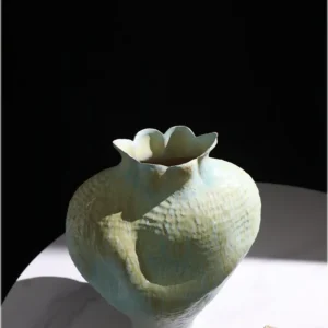 Jingdezhen Celadon Gradient Pomegranate Floor Vase, Large in olive — in a room setting