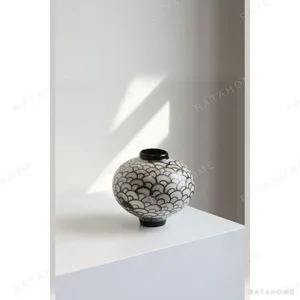Artist Hand-Made Moon Jar with Scale Pattern, Jingdezhen in black — in a room setting