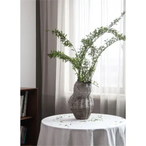 Jingdezhen Grey Twisted Rib Sculptural Vase, Large in slate — in a room setting