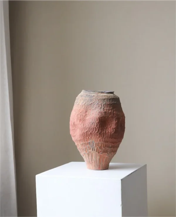 Jingdezhen Red Clay Textured Jar Vase, Medium in rust — in a room setting
