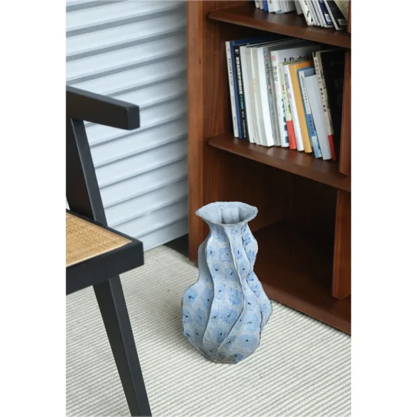 Jingdezhen Blue Geometric Faceted Stoneware Vase, Medium in blue — in a room setting