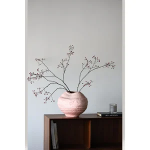 Pink Sand Textured Round Ceramic Vase with Torn Rim in rose stone — in a room setting