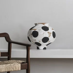 Wabi-Sabi Black Polka Dot Narrow-Mouth Ceramic Vase, Small in oatmeal — in a room setting