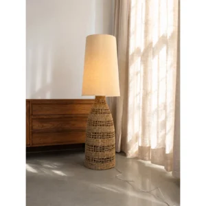 Wabi-Sabi Hand-Woven Rattan Bottle Floor Lamp in clay — in a room setting