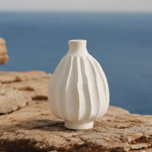 Wabi-Sabi Ribbed White Ceramic Vase, Two Forms in ivory — in a room setting