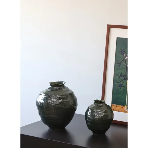 Wabi-Sabi Dark Green Glazed Round-Belly Jar, Large or Small in olive — in a room setting