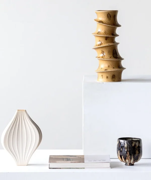 Wabi-Sabi Twisted Bamboo Column Vase in Honey Glaze — in a room setting