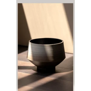 Wabi-Sabi Swirl Gradient Ceramic Jar Vase, Two Forms in slate — in a room setting