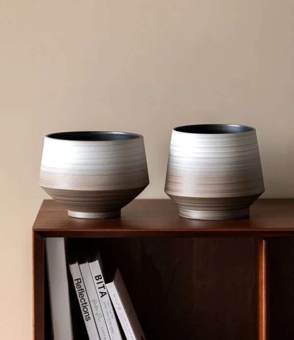 Wabi-Sabi Swirl Gradient Ceramic Jar Vase, Two Forms in slate — in a room setting