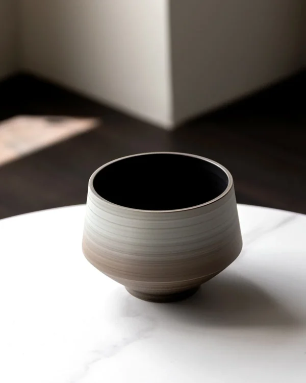 Wabi-Sabi Swirl Gradient Ceramic Jar Vase, Two Forms in slate — in a room setting