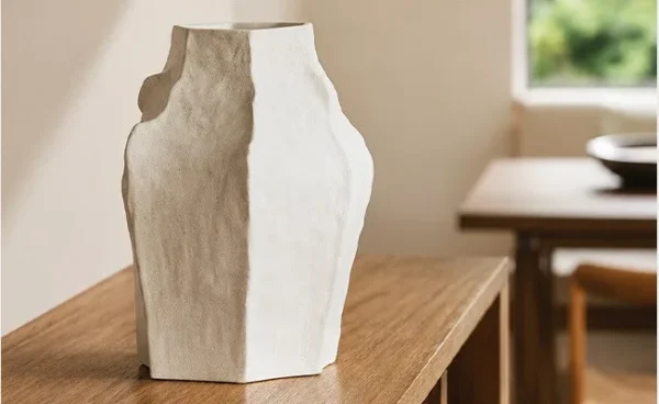 Designer Wabi-Sabi Faceted Cream Ceramic Vase, Large in oatmeal — in a room setting