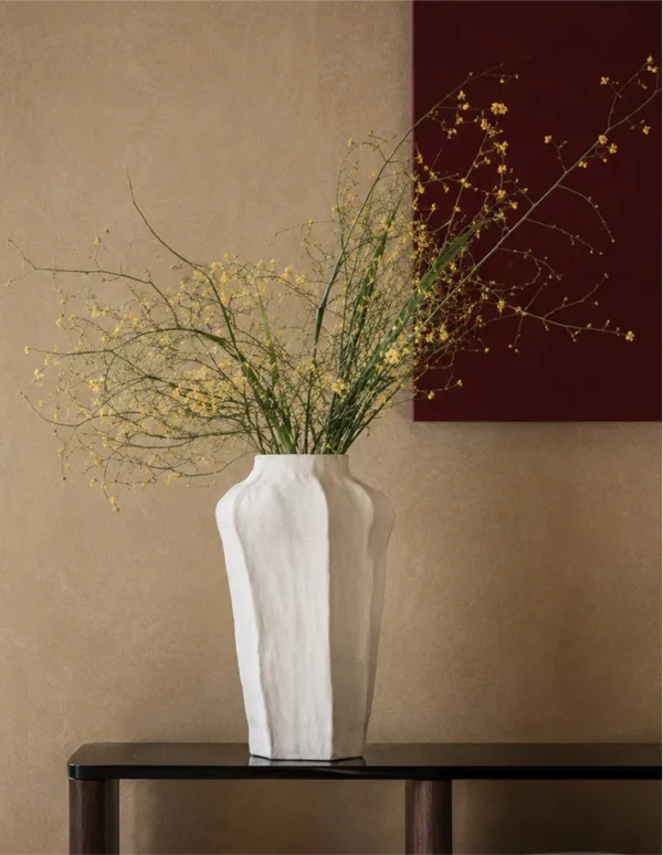 Designer Wabi-Sabi Faceted Cream Ceramic Vase, Large in oatmeal — in a room setting